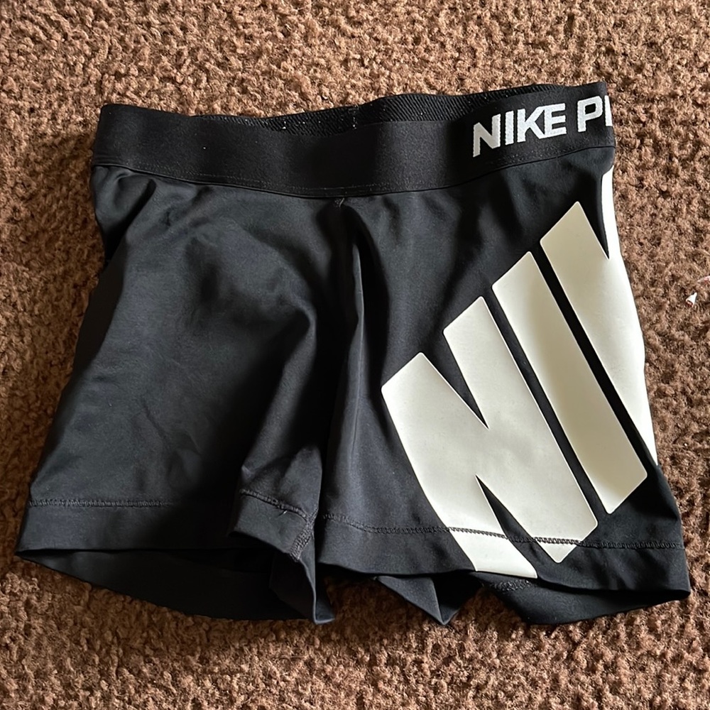 Small Black Nike Pros with Logo